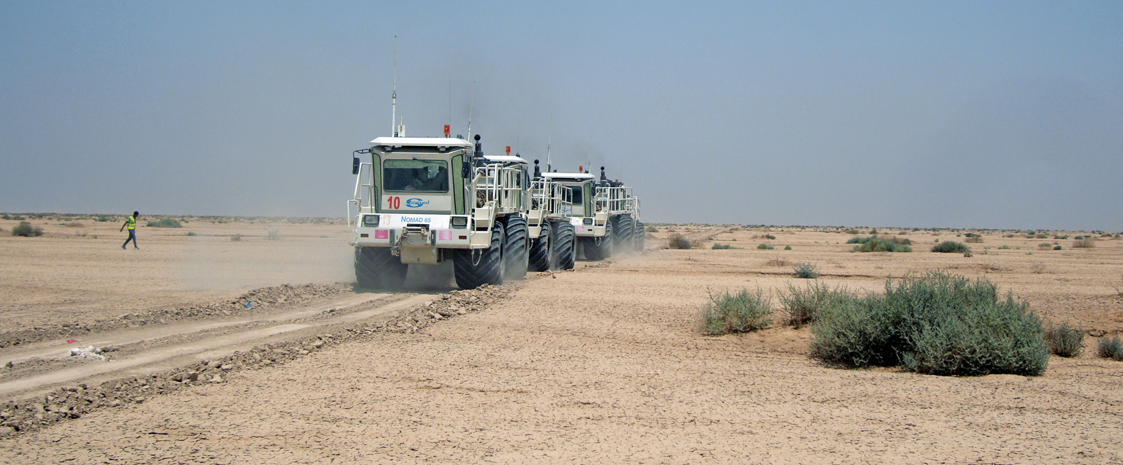Vibrators on line during seismic survey in Block 8 Iraq 
