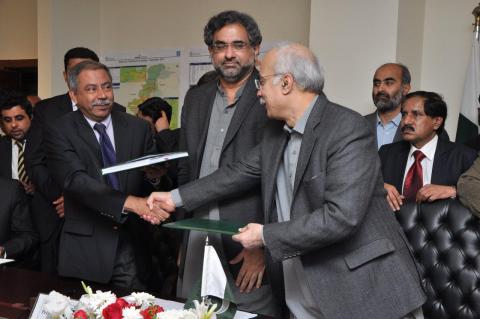 (left to right) MD and CEO Asim Murtaza Khan exchanges Petroleum Concession Agreement document with Secretary Ministry of Petroleum and Natural Resources Abid Saeed at a ceremony organized in Islamabad in February 2014 to grant exploration blocks awarded to PPL during March 2013 bidding round. Federal Minister for Petroleum and Natural Resources Shahid Khaqan Abbasi is also present at the occasion. A total of three PCAs/ Exploration Leases signing rounds between PPL and the Government of Pakistan were organ