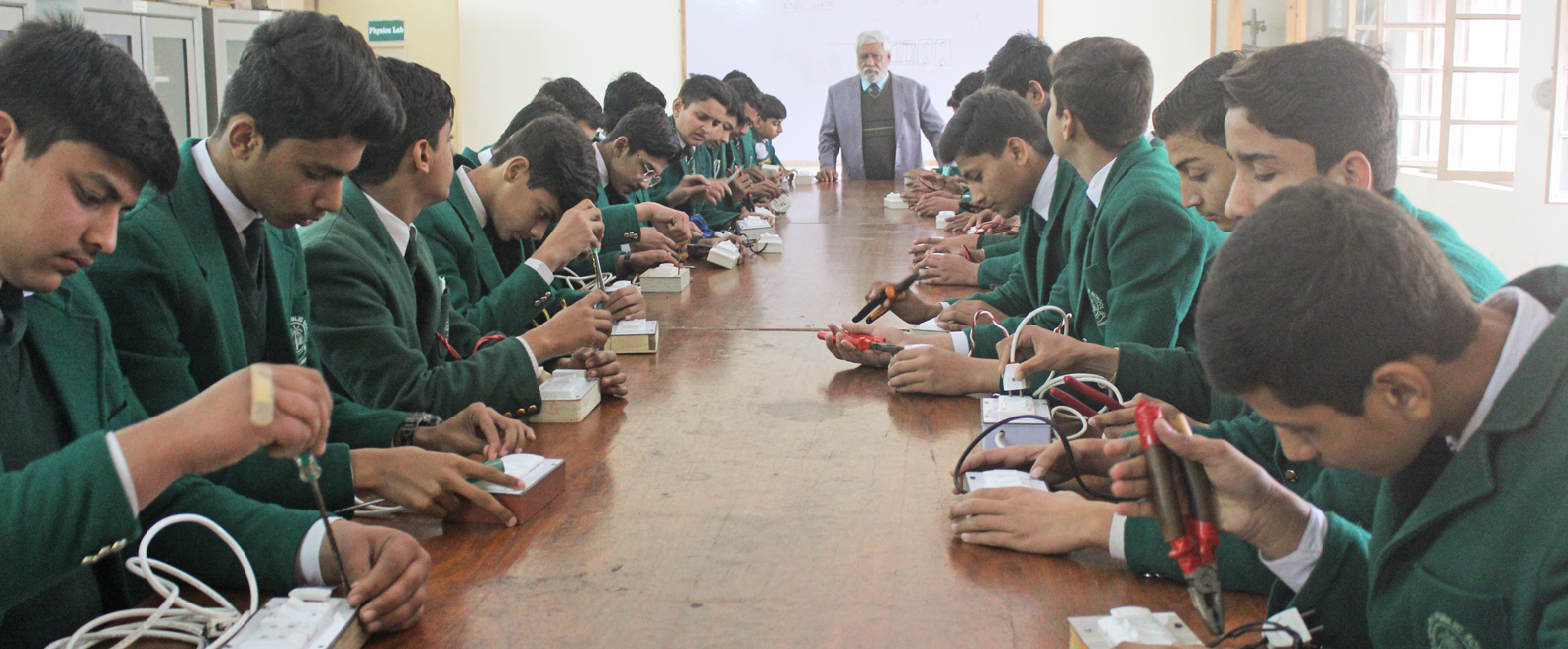 Students at science laboratory of Aligarh Public School, Boys Section managed by Tehzibul Akhlaq Trust