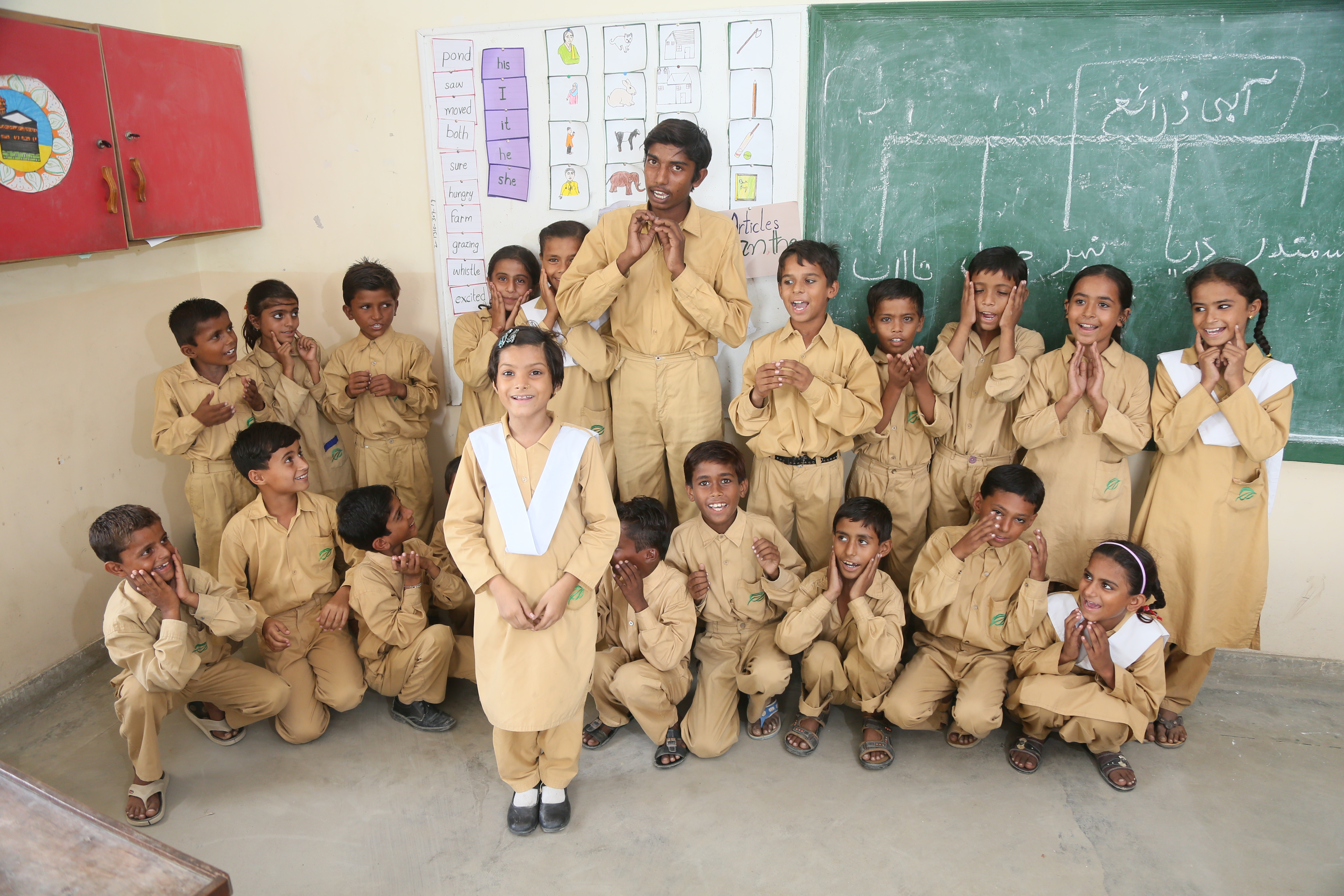 Students perform in a group at PPL TCF School, Bajkani Campus Sindh