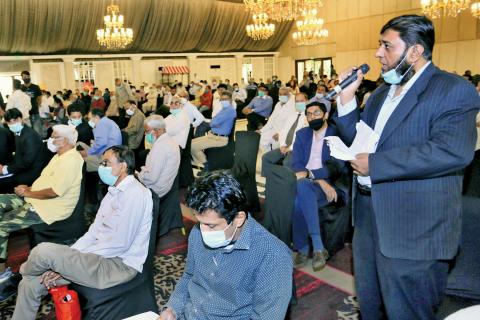 A financial analyst speaks during Annual General Meeting 2020 in Karachi