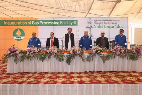 Federal Petroleum Minister Shahid Khaqan Abbasi and MD and CEO PPL ( third and fourth left) with other officials during the inauguration ceremony of Gas Processing Facility-II at PPL-operated Gambat South Block District Sanghar Sindh on December 23 2016