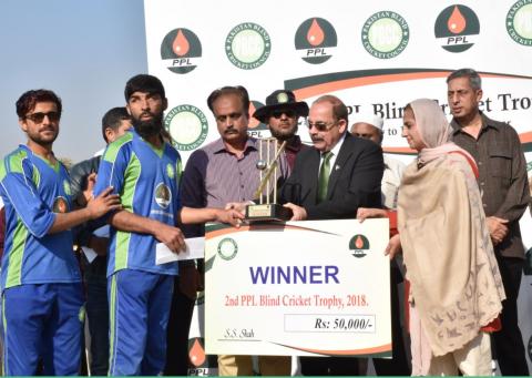 Winning Captain Muhammad Zafar of Bahawalpur receiving the trophy from chief guest Member Provincial Assembly Khyber Pakhtunkhawa Madiha Nisar along with MD and CEO PPL Saeed Ullah Shah and Chairman Pakistan Blind Cricket Council Syed Sultan Shah (first to third right) at the closing ceremony of the 2nd PPL Blind Cricket Championship 2018 on December 1 2018