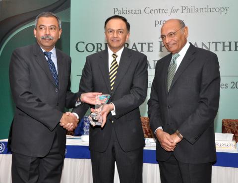 (left to right) MD and CEO  Pakistan Petroleum Limited (PPL) Asim Murtaza Khan receives the Corporate Philanthropy Award from Governor  State Bank of Pakistan Yaseen Anwar. Chairman  Board of Directors  Pakistan Centre for Philanthropy Dr. Shamsh Kassim-Lakha is also present. PPL was declared the largest corporate giver by total volume of donations for 2010 for the seventh consecutive year at the Corporate Philanthropy Awards hosted by Pakistan Centre for Philanthropy in Karachi on December 15  2011