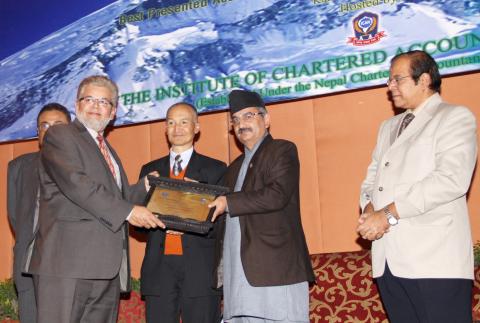 Pakistan Petroleum Limited's General Manager Finance and Chief Financial Officer Kamran Wahab Khan receives the South Asian Federation of Accountants Award for 'Best Presented Accounts for Annual Report 2009 from Nepal Finance Minister Surendra Pandey on December 12 2010