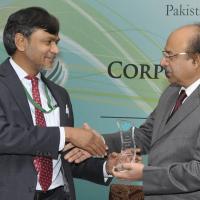 (left to right) PPL Deputy Managing Director Moin Raza Khan receives the award from Speaker Sindh Assembly Nisar Ahmed Khuhro