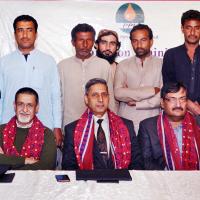 GMCS PPL Furqan Uddin Sheikh and CEO SRO Ghulam Hussain Khwaja (seated fourth and sixth left) with officials from both organizations and participants at a local hotel in Karachi during the training on use of PPL-funded solar power modules for Awaran  Balochistan